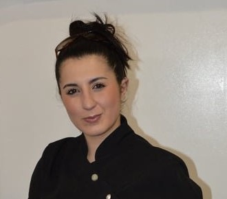 Vasii, owner of Curl Up & Dye